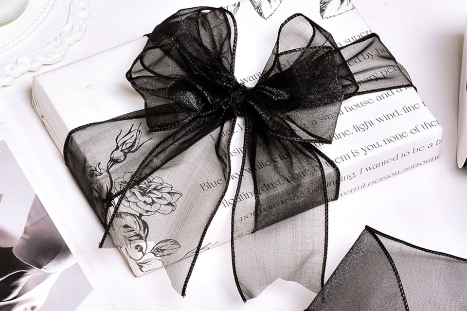 Wired ribbon decorating a wedding venue